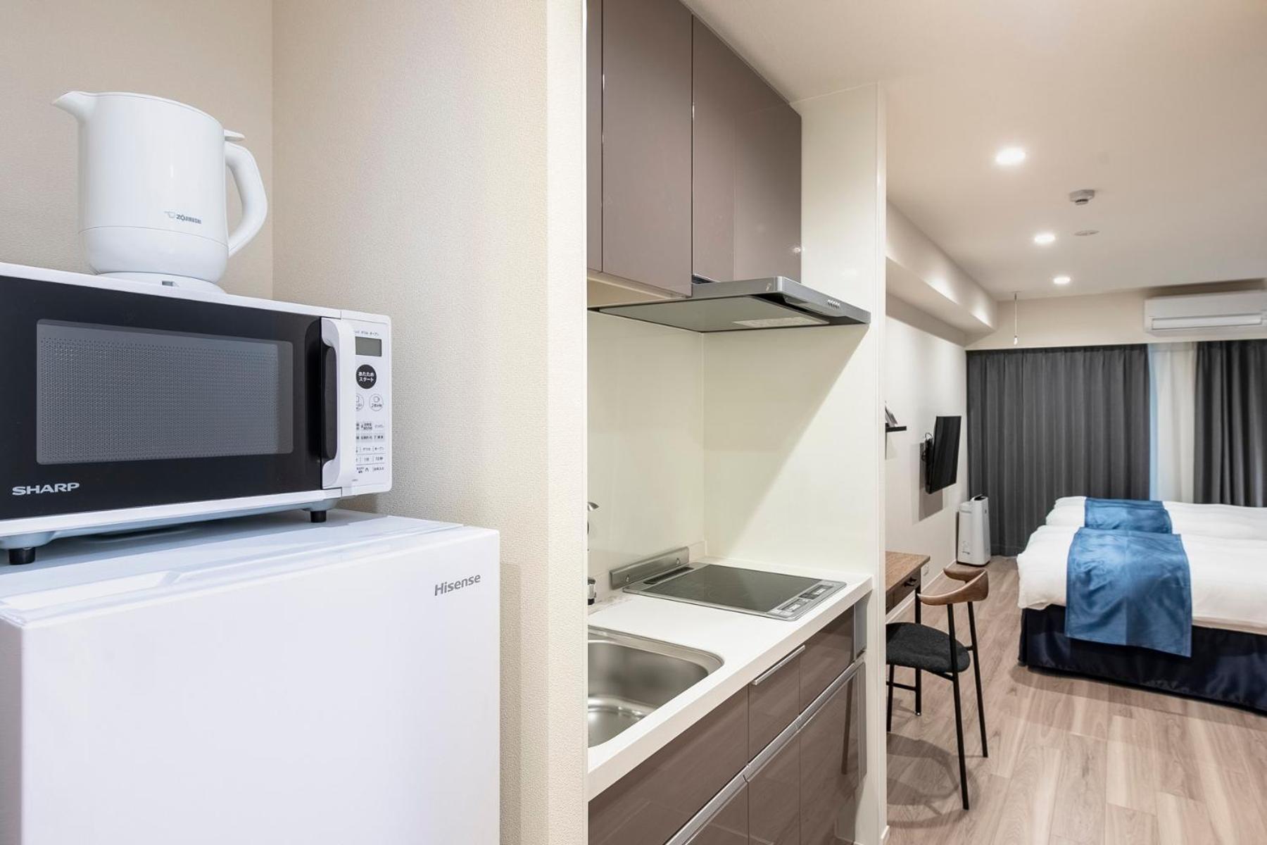 hotel aima Tokio Habitación foto