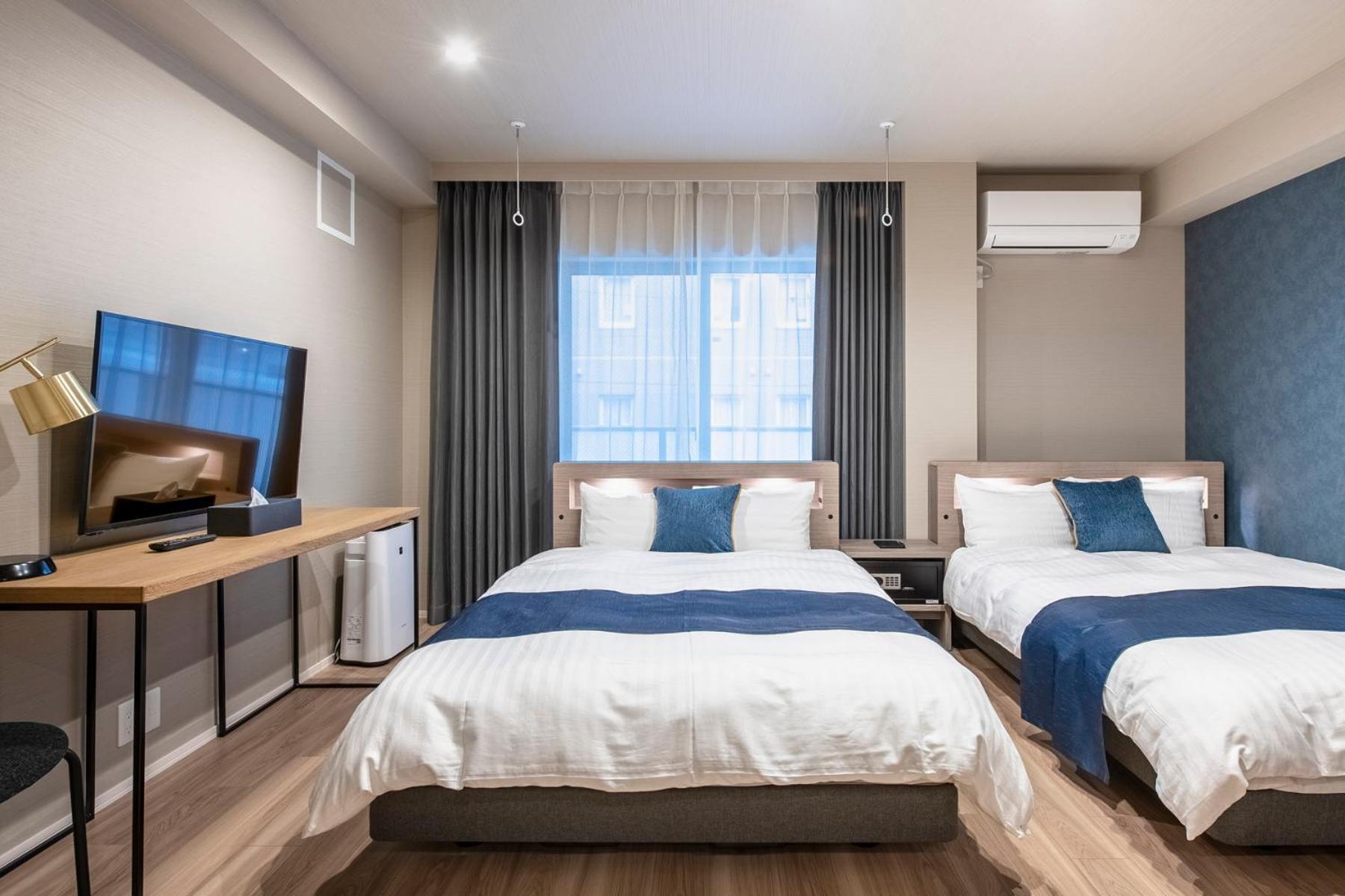 hotel aima Tokio Habitación foto
